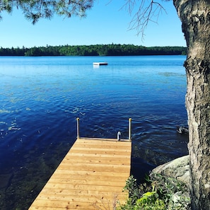 dock and raft at the farm's private beach area on Toddy Pond