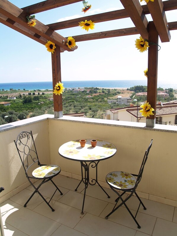 The balcony on first floor with 180 degrees view of the Mediterranen Sea.