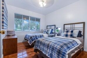 Two (2) twin beds