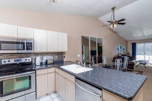 Plenty of counter space in the kitchen makes preparing home-cooked meals easy!