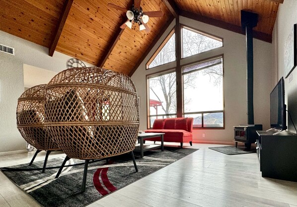 Cozy Great Room with large windows, Sierra Views, Wood Stove, TV, and Sonos  