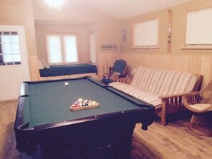 game room , futon, twin bed