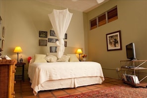 Bedroom 2 with flat screen tv, optional AC, walk out to gallery, sitting area