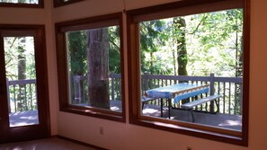 View from dining area out to deck & picnic table