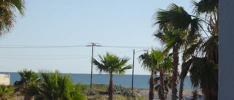 View to the beach from the master bedroom balcony 