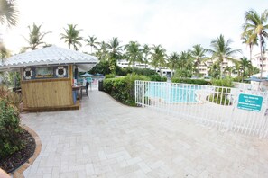 enjoy drinks and food at pool bar