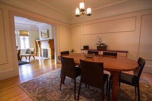 Spacious dining room with seating for six.