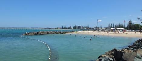 Short walk to Tuncurry rockpool, BBQ area, cafe, breakwall and beach.