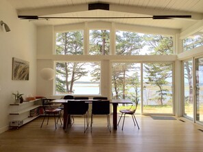 Open dining area with sliders to the bluestone patio.