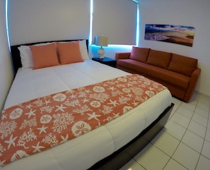 Bedroom with Queen bed and convertible sofa bed.