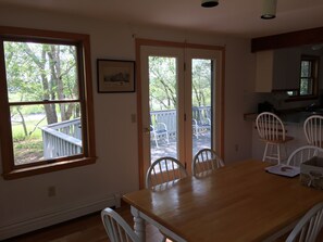 Dining room with doors to deck