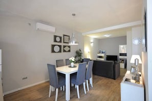 Living room with dining room and sea view