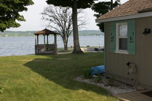 Lined with trees and only a few feet from the lake and beach.