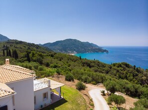 The villa looking the famous sandy beach of Agios Gordios 