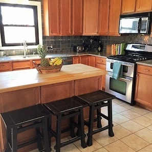 Pull up a stool for a snack or go into the large adjacent dining room