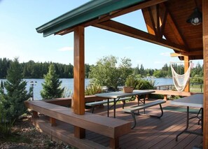 Covered patio with amazing Lake Views provide all season outdoor dining options.