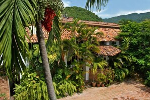 The main building displays red tile roofs of traditional Mexican architecture