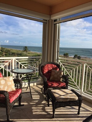 Balcony with rockers, dining table, chairs. Remote close screens. Fabulous view.