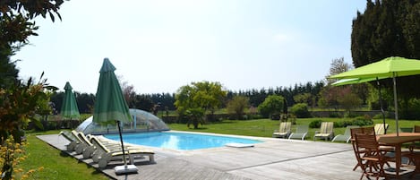 Piscine avec abri découvert