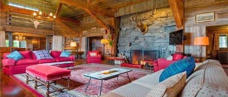 Great Room, Majestic Floor to Ceiling Stone Fireplace, Rustic Wood Beams