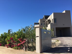 Car port, gated property driveway 