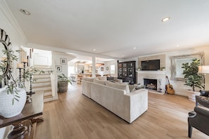 Living room with Wood Burning Fireplace!