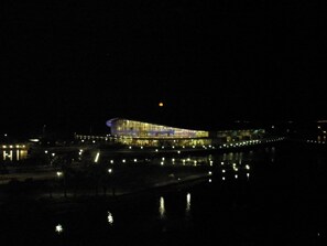 Moon coming up over The Darwin Convention Center viewed from the apartment.