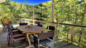 Enjoy the large deck with wooded views