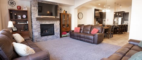 Great room with fire place and big screen TV