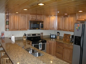 Fully equipped kitchen featuring all appliances.