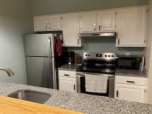 Modern appliances and granite counters for your stay.