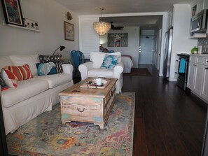 Full view of the condo from the back sliding doors. Tile flooring easy to clean 