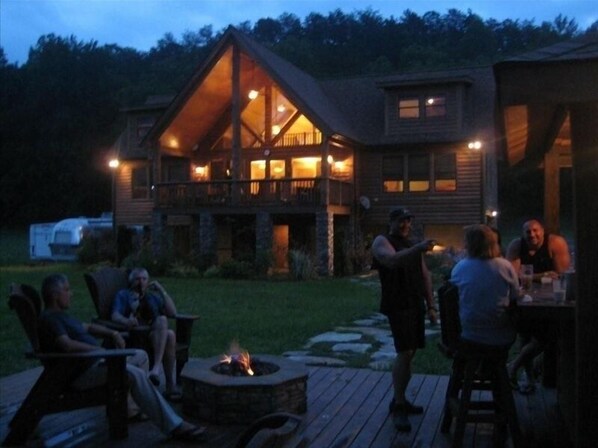 VIEW OF THE HOUSE FROM THE OUTSIDE FIREPIT/BARBEQUE AREA