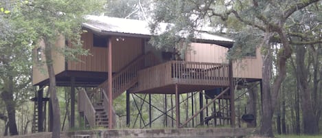 Cabin with deck in the trees