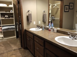 Master bathroom with shower and his/her sinks........walk in closet