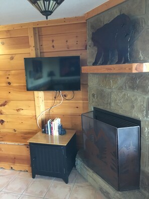 new 42" wall mounted tv; can be adjusted to be viewed  from bed, too