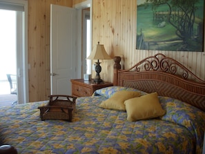 The East Master Bedroom at Kokomo - with King Bed & great beach view.