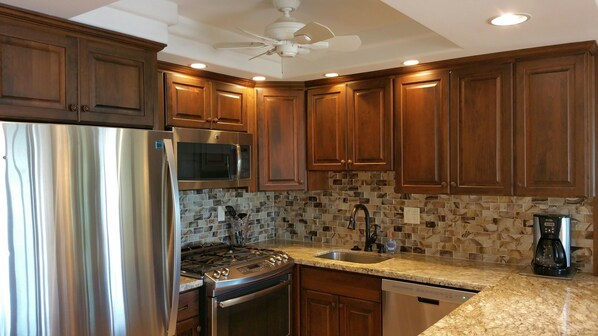 New Kitchen With Custom DeWills Cabinets and Stainless Steel Appliances