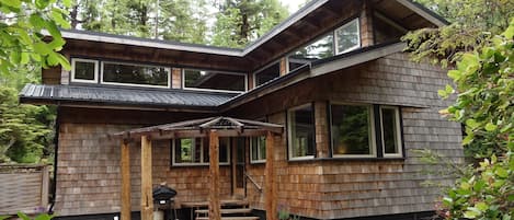 Timber frame home tucked in the west coast rainforest of Tofino BC.