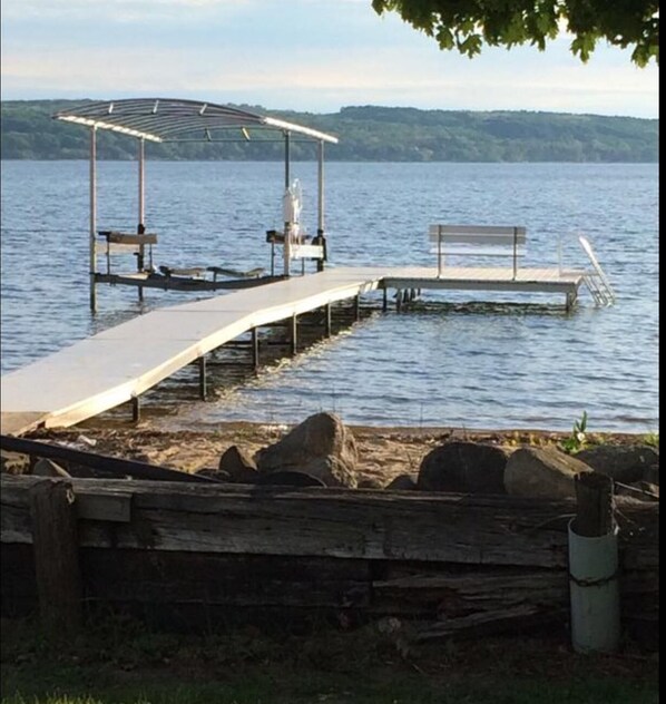 Dock for your use, hoist no longer available.  Sandy bottom.