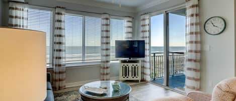 Living Room with Ocean Views and Balcony Access at 3404 Sea Crest