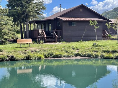Porch is steps from our freshly stocked Rainbow Trout pond, no license required