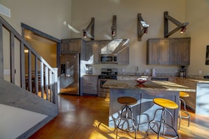 Kitchen Area with Dining Room in Background