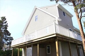 deck off kitchen slider and outdoor shower/changing area