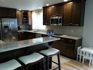 Kitchen with stainless steel appliances and granite counter tops