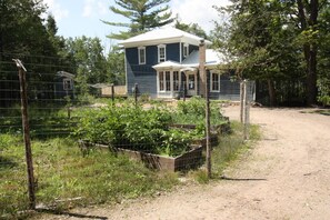 As you come down the drive, you'll see the garden in front.