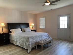 1st spacious & airy master bdrm with walk-in closet, full bathroom, and balcony 