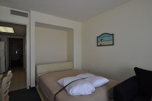Murphy bed pulls down from wall in living room