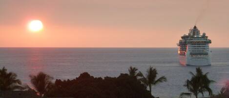 Relax on the lanai and watch cruise ships leave at sunset.