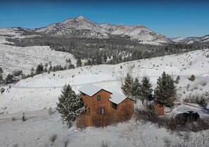 Elk Cabin's stunning winter view of snow capped Thunder Butte Mountain